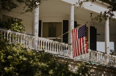 american flag hung on house